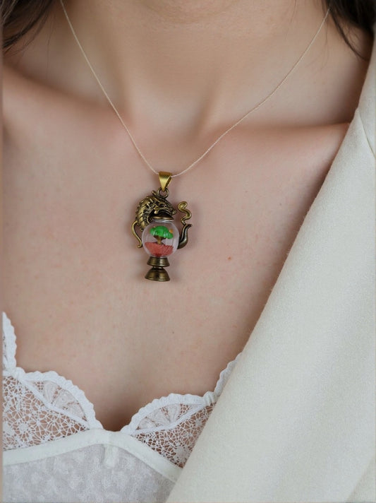 alt="Worn Dragonbrew Teapot Necklace with dragon pendant"