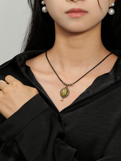 Serene Lotus Guardian Pendant – Brass Relief Resin Necklace