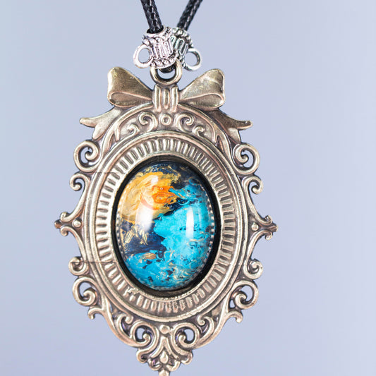 Galaxy Nebula Pendant Necklace – Hand-Painted Cosmic Sky in Vintage Brass Bow Frame | Space Fantasy Jewelry